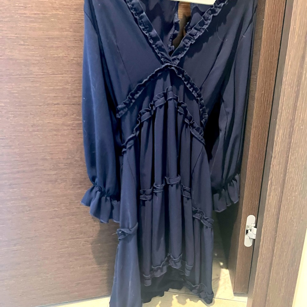 Navy mini dress that’s flowy and backless